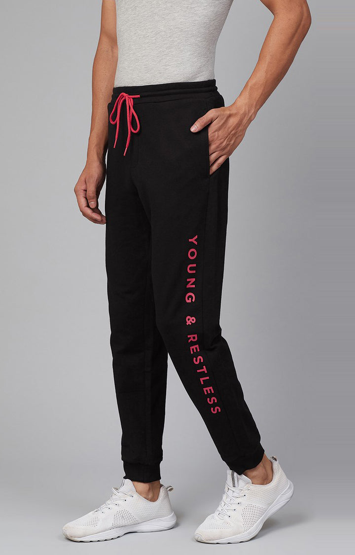 Black Cotton Blend Solid Trackpants- UnderJeans by Spykar