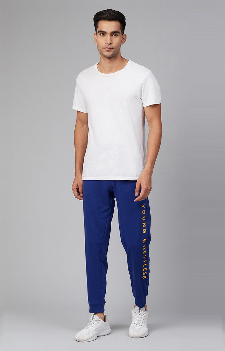 Blue Cotton Blend Solid Trackpants- UnderJeans by Spykar