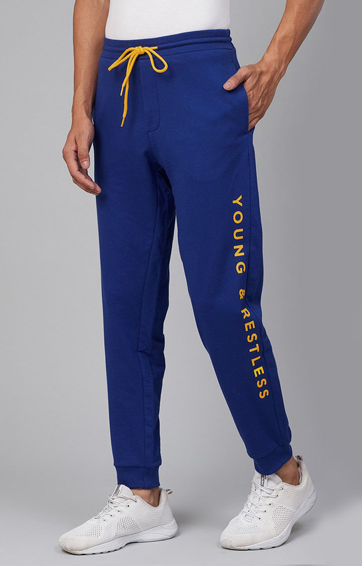 Blue Cotton Blend Solid Trackpants- UnderJeans by Spykar
